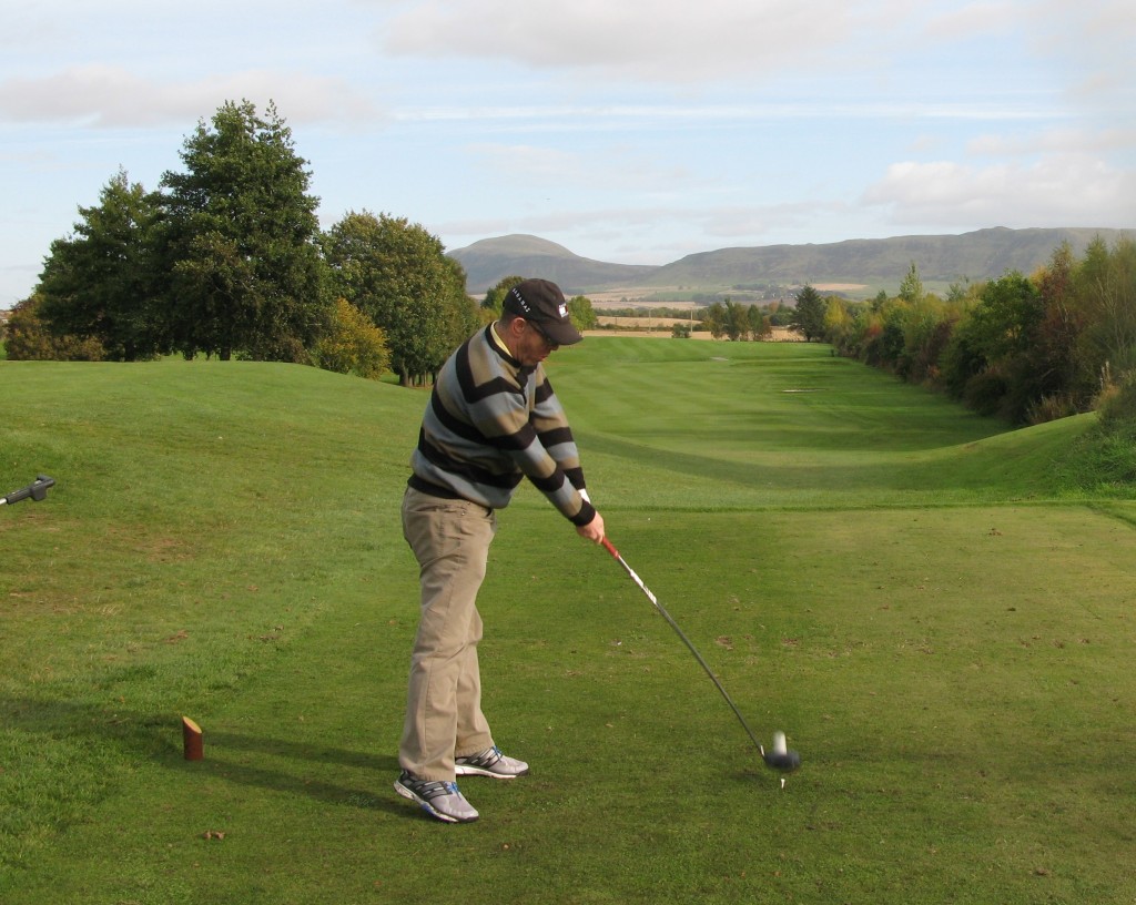 Moly on the 6th tee at Milnathort - need to get the hips out of the way! Lomond Hills in the distance.